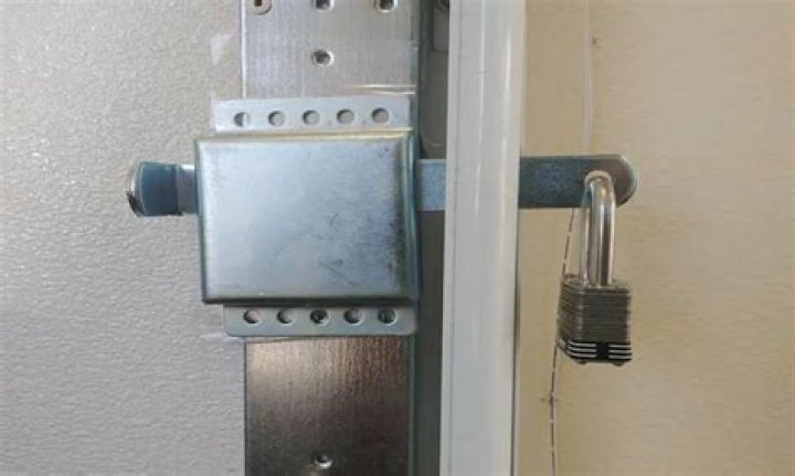 How do you unfreeze a garage door lock?